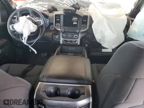 2023 Ram 1500 Lone Star with VIN 1C6SRFFT6PN697147, listed as a Copart auction lot 68788115 with 10,811 mi miles and Salvage title. Bid and sale history available at DreamBid. Image 8.