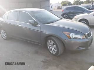 2009 Honda Accord EX with VIN 1HGCP36769A014959, listed as a IAAI auction lot 42328233 with 130,666 mi miles and . Bid and sale history available at DreamBid. Image 1.