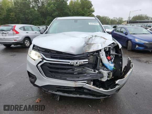 2018 Chevrolet Traverse LS с VIN 1GNERFKWXJJ102389, выставлен на аукционе Copart как лот 81070055 с пробегом 65 157 миль миль и Списание • Salvage title. История ставок и продаж доступна на DreamBid. Изображение 5.