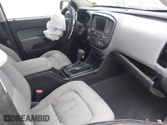 2021 Chevrolet Colorado 4WD Work Truck z VIN 1GCGTBEN9M1296691, wystawiony jako IAAI lot #41460241 z przebiegiem 55 952 mil mil oraz . Historia ofert i sprzedaży dostępna na DreamBid. Obrazek 5.