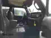 2022 Jeep Wrangler Unlimited Rubicon with VIN 1C4JJXR63NW228550, listed as a IAAI auction lot 41957313 with 15,860 mi miles and . Bid and sale history available at DreamBid. Image 5.