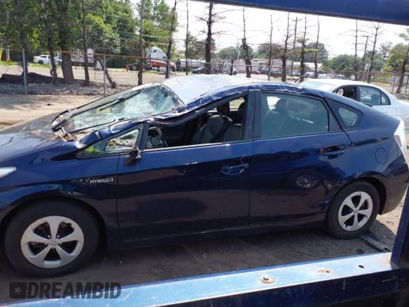 2012 Toyota Prius One with VIN JTDKN3DU3C1609459, listed as a IAAI auction lot 42693489 with 162,236 mi miles and . Bid and sale history available at DreamBid. Image 14.