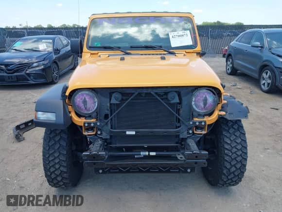 2021 Jeep Wrangler Unlimited Sport Altitude with VIN 1C4HJXDN4MW671222, listed as a IAAI auction lot 42700872 with 49,482 mi miles and . Bid and sale history available at DreamBid. Image 12.