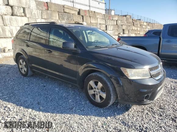 2012 Dodge Journey SXT z VIN 3C4PDCBGXCT307164, wystawiony jako Copart lot #85708485 z przebiegiem 137 181 mil mil oraz Szkoda całkowita • Salvage title. Historia ofert i sprzedaży dostępna na DreamBid. Obrazek 4.