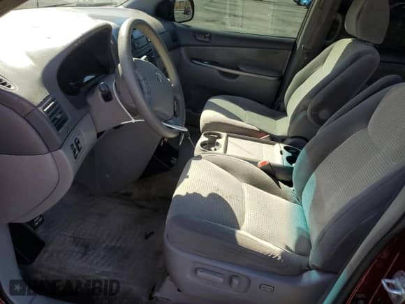 2009 Toyota Sienna LE с VIN 5TDZK23C69S258228, выставлен на аукционе Copart как лот 82336515 с пробегом 268 165 миль миль и Списание • Salvage title. История ставок и продаж доступна на DreamBid. Изображение 7.