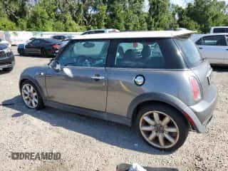 2006 MINI Hardtop S with VIN WMWRE335X6TJ40269, listed as a Copart auction lot 62719735 with 96,215 mi miles and Salvage title. Bid and sale history available at DreamBid. Image 2.