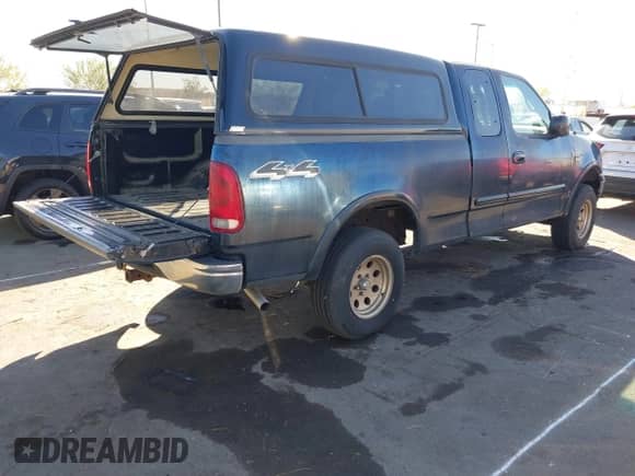 2000 Ford F-150 XL with VIN 1FTRX18W1YNC02247, listed as a IAAI auction lot 43464551 with Not provided miles and . Bid and sale history available at DreamBid. Image 4.