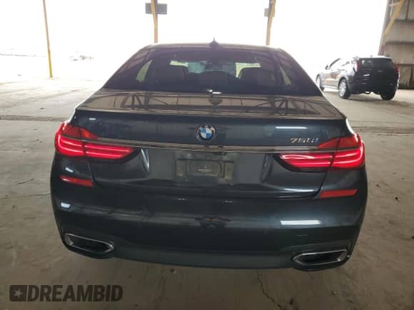 2017 BMW 7 Series 750i with VIN WBA7F0C51HGM21410, listed as a Copart auction lot 80801545 with 75,738 mi miles and Salvage title. Bid and sale history available at DreamBid. Image 6.