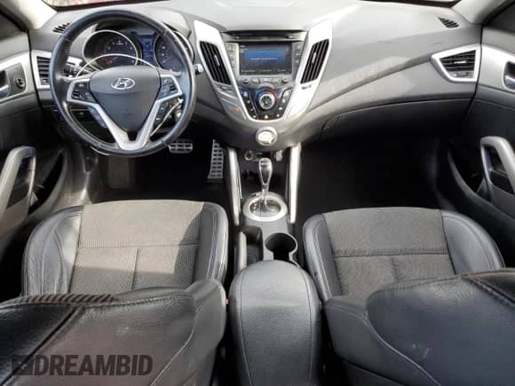 2013 Hyundai Veloster w/Black Int с VIN KMHTC6AD5DU178389, выставлен на аукционе Copart как лот 80652785 с пробегом 150 305 миль миль и Списание • Salvage title. История ставок и продаж доступна на DreamBid. Изображение 8.