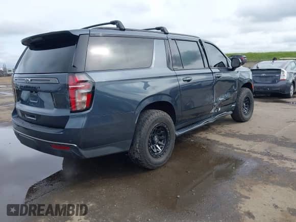 2021 Chevrolet Suburban Z71 with VIN 1GNSKDKD2MR379098, listed as a IAAI auction lot 41836921 with 53,532 mi miles and . Bid and sale history available at DreamBid. Image 4.