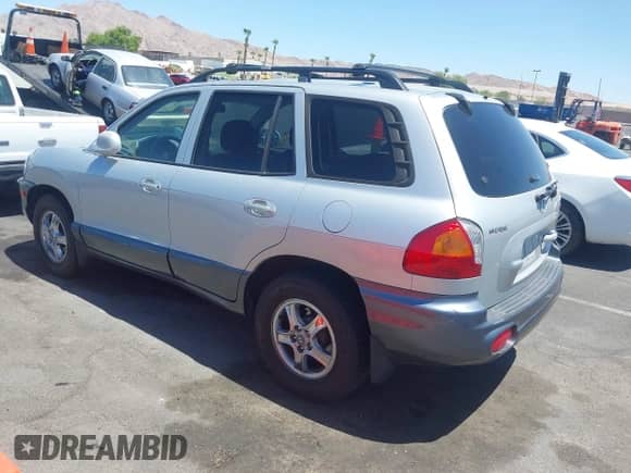 2004 Hyundai Santa Fe GLS with VIN KM8SC13E24U692561, listed as a IAAI auction lot 42888708 with 144,822 mi miles and . Bid and sale history available at DreamBid. Image 3.