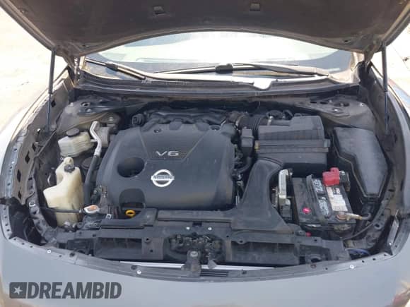 2014 Nissan Maxima S z VIN 1N4AA5AP4EC905900, wystawiony jako IAAI lot #43124050 z przebiegiem 115 628 mil mil oraz . Historia ofert i sprzedaży dostępna na DreamBid. Obrazek 10.