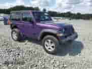 2023 Jeep Wrangler Sport S with VIN 1C4HJXAG5PW577764, listed as a Copart auction lot 80317685 with 58,232 mi miles and Salvage title. Bid and sale history available at DreamBid. Image 4.