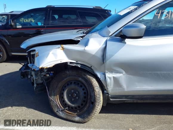 2016 Nissan Rogue SV with VIN JN8AT2MT6GW021409, listed as a IAAI auction lot 43118867 with 103,169 mi miles and . Bid and sale history available at DreamBid. Image 17.
