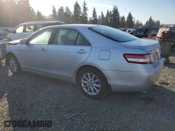 2011 Toyota Camry LE with VIN 4T1BK3EKXBU128008, listed as a Copart auction lot 82247415 with 180,539 mi miles and Clean title. Bid and sale history available at DreamBid. Image 2.