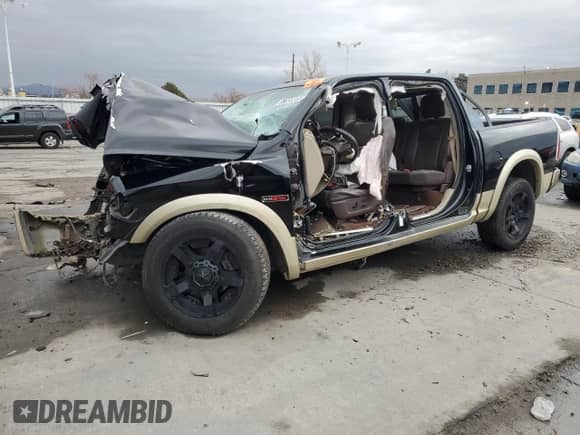 2015 Ram 1500 Laramie Longhorn с VIN 1C6RR7PM6FS536857, выставлен на аукционе Copart как лот 89286355 с пробегом Не указан миль и На запчасти • Non repairable. История ставок и продаж доступна на DreamBid. Изображение 1.