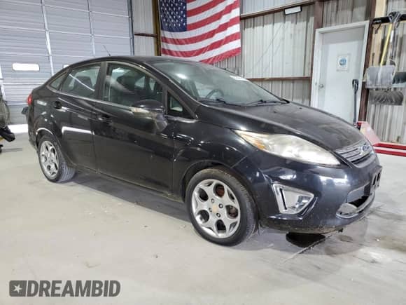 2011 Ford Fiesta SEL with VIN 3FADP4CJ0BM207325, listed as a Copart auction lot 67474035 with Not provided miles and Clean title. Bid and sale history available at DreamBid. Image 4.