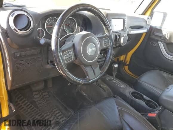 2015 Jeep Wrangler Rubicon z VIN 1C4BJWCG6FL568665, wystawiony jako Copart lot #85307974 z przebiegiem 107 407 mil mil oraz Szkoda całkowita • Salvage title. Historia ofert i sprzedaży dostępna na DreamBid. Obrazek 8.