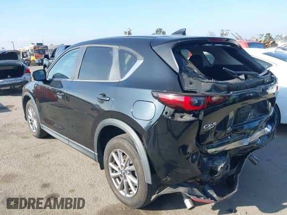 2022 Mazda CX-5 S Select z VIN JM3KFBBMXN0624955, wystawiony jako IAAI lot #43335876 z przebiegiem 77 689 mil mil oraz . Historia ofert i sprzedaży dostępna na DreamBid. Obrazek 3.