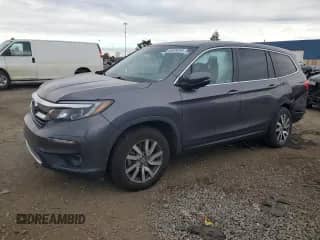 2021 Honda Pilot EX-L z VIN 5FNYF6H5XMB009509, wystawiony jako Copart lot #86309245 z przebiegiem 51 429 mil mil oraz Czysty tytuł • Clean title. Historia ofert i sprzedaży dostępna na DreamBid. Obrazek 1.