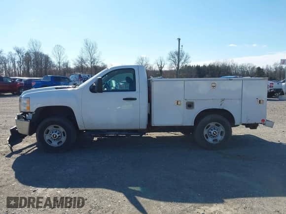 2013 Chevrolet Silverado 2500HD Work Truck z VIN 1GB0KVCGXDZ147318, wystawiony jako IAAI lot #41395263 z przebiegiem 149 258 mil mil oraz . Historia ofert i sprzedaży dostępna na DreamBid. Obrazek 14.