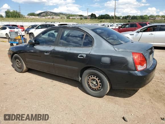 2005 Hyundai Elantra GLS z VIN KMHDN46D45U021031, wystawiony jako Copart lot #70877694 z przebiegiem 184 824 mil mil oraz Szkoda całkowita • Salvage title. Historia ofert i sprzedaży dostępna na DreamBid. Obrazek 2.