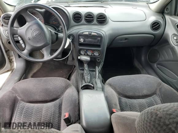 2001 Pontiac Grand Am SE1 с VIN 1G2NF52T21M607203, выставлен на аукционе Copart как лот 57080645 с пробегом 209 896 миль миль и Списание • Salvage title. История ставок и продаж доступна на DreamBid. Изображение 8.