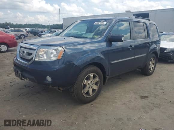 2010 Honda Pilot Touring with VIN 5FNYF4H85AB003241, listed as a Copart auction lot 64334555 with 234,506 mi miles and Salvage title. Bid and sale history available at DreamBid. Image 1.
