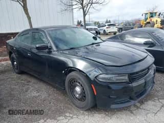 2015 Dodge Charger Police z VIN 2C3CDXKT7FH875599, wystawiony jako IAAI lot #40830961 z przebiegiem 148 964 mil mil oraz . Historia ofert i sprzedaży dostępna na DreamBid. Obrazek 1.