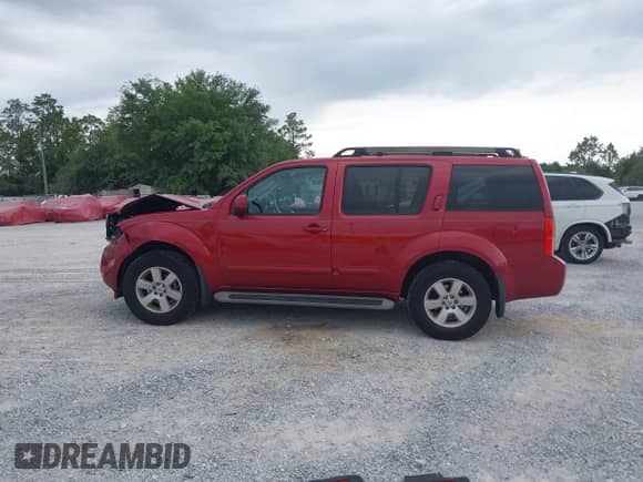 2011 Nissan Pathfinder S with VIN 5N1AR1NN5BC615953, listed as a IAAI auction lot 42327751 with 197,621 mi miles and . Bid and sale history available at DreamBid. Image 14.