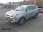 2015 Hyundai Tucson SE with VIN KM8JU3AG1FU116018, listed as a IAAI auction lot 43443014 with 141,816 mi miles and . Bid and sale history available at DreamBid. Image 2.