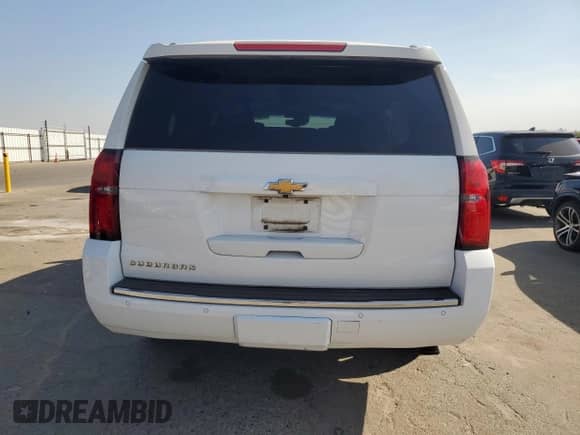 2016 Chevrolet Suburban LTZ with VIN 1GNSCJKC7GR415956, listed as a Copart auction lot 71857055 with 213,861 mi miles and Salvage title. Bid and sale history available at DreamBid. Image 6.