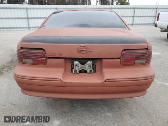 1994 Chevrolet Caprice LS z VIN 1G1BN52P9RR179402, wystawiony jako Copart lot #87580475 z przebiegiem 849 mil mil oraz Szkoda całkowita • Salvage title. Historia ofert i sprzedaży dostępna na DreamBid. Obrazek 6.