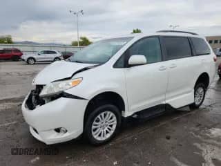 2015 Toyota Sienna XLE with VIN 5TDYK3DC6FS576944, listed as a Copart auction lot 86149425 with 57,182 mi miles and Salvage title. Bid and sale history available at DreamBid. Image 1.