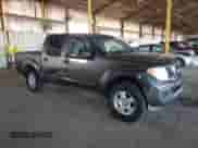 2007 Nissan Frontier SE with VIN 1N6AD07U67C431739, listed as a Copart auction lot 86591175 with 131,668 mi miles and Salvage title. Bid and sale history available at DreamBid. Image 4.
