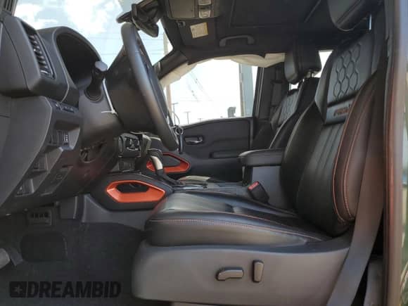 2023 Nissan Frontier Pro-X with VIN 1N6ED1EJ6PN670843, listed as a Copart auction lot 51841865 with 8,825 mi miles and Salvage title. Bid and sale history available at DreamBid. Image 7.