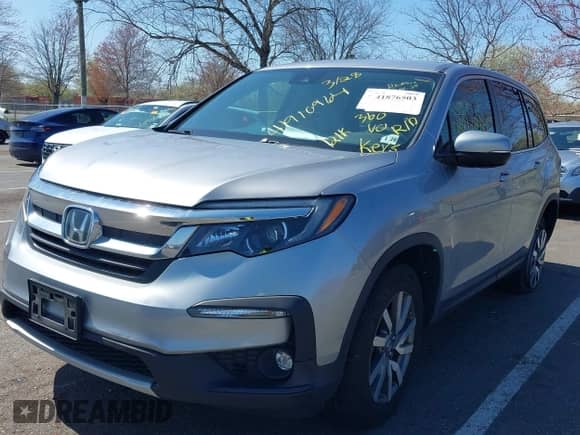 2021 Honda Pilot EX z VIN 5FNYF6H31MB023233, wystawiony jako IAAI lot #41876503 z przebiegiem Nie podano mil oraz . Historia ofert i sprzedaży dostępna na DreamBid. Obrazek 2.