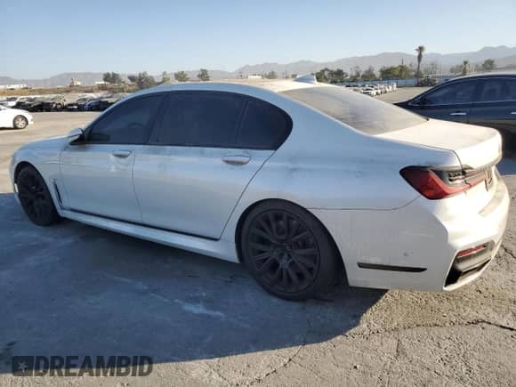 2022 BMW 7 Series 740i z VIN WBA7T2C06NCK72777, wystawiony jako Copart lot #72420104 z przebiegiem 33 762 mil mil oraz Szkoda całkowita • Salvage title. Historia ofert i sprzedaży dostępna na DreamBid. Obrazek 2.