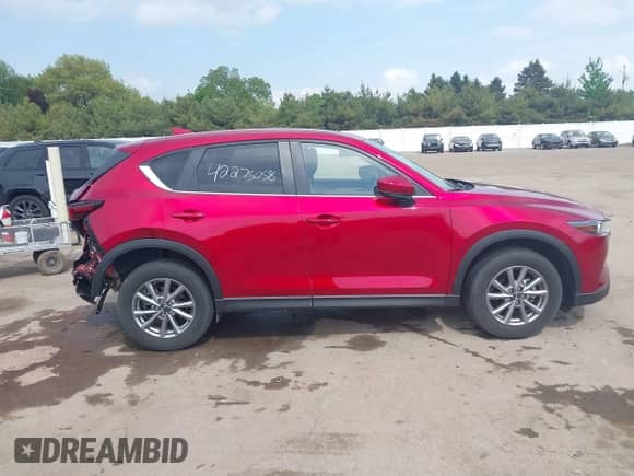 2022 Mazda CX-5 S Select z VIN JM3KFBBM7N0528989, wystawiony jako IAAI lot #42275058 z przebiegiem 19 058 mil mil oraz . Historia ofert i sprzedaży dostępna na DreamBid. Obrazek 13.