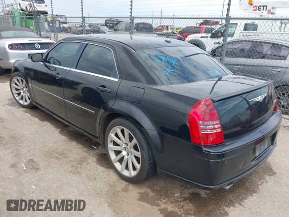 2006 Chrysler 300 C SRT-8 with VIN 2C3LA73W26H346661, listed as a IAAI auction lot 42990681 with 129,580 mi miles and . Bid and sale history available at DreamBid. Image 3.