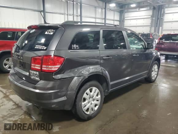 2016 Dodge Journey SE z VIN 3C4PDCAB9GT186896, wystawiony jako Copart lot #66667785 z przebiegiem 202 884 mil mil oraz Szkoda całkowita • Salvage title. Historia ofert i sprzedaży dostępna na DreamBid. Obrazek 3.
