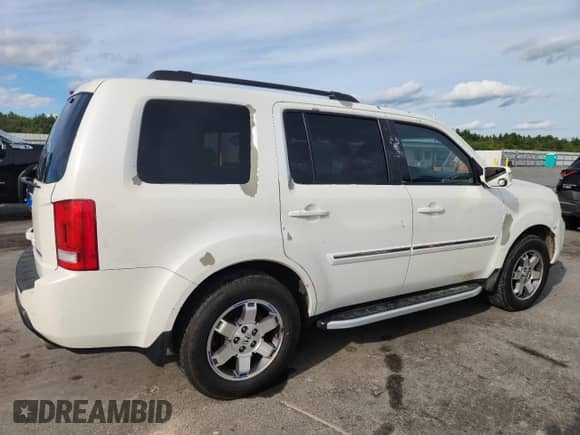 2011 Honda Pilot Touring с VIN 5FNYF3H94BB029768, выставлен на аукционе Copart как лот 71886275 с пробегом 186 127 миль миль и Списание • Salvage title. История ставок и продаж доступна на DreamBid. Изображение 3.