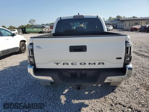2021 Toyota Tacoma SR5 with VIN 3TYAZ5CN6MT005354, listed as a Copart auction lot 70816115 with 144,733 mi miles and Salvage title. Bid and sale history available at DreamBid. Image 6.