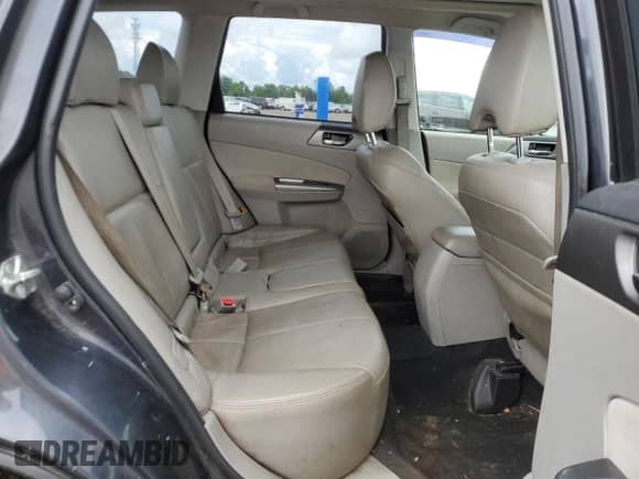 2011 Subaru Forester z VIN JF2SHBHC7BH719649, wystawiony jako Copart lot #57782065 z przebiegiem 241 157 mil mil oraz Szkoda całkowita • Salvage title. Historia ofert i sprzedaży dostępna na DreamBid. Obrazek 11.