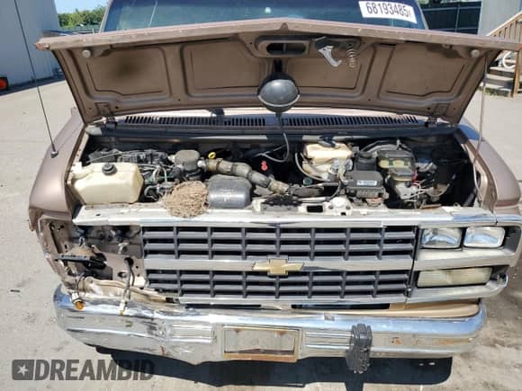 1995 Chevrolet Chevy Van с VIN 1GBEG25Z4SF163727, выставлен на аукционе Copart как лот 68193485 с пробегом 165 321 миль миль и Списание • Salvage title. История ставок и продаж доступна на DreamBid. Изображение 12.