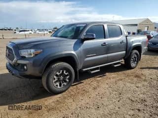 2019 Toyota Tacoma SR with VIN 3TMCZ5AN2KM234988, listed as a Copart auction lot 80274125 with 48,661 mi miles and Salvage title. Bid and sale history available at DreamBid. Image 1.