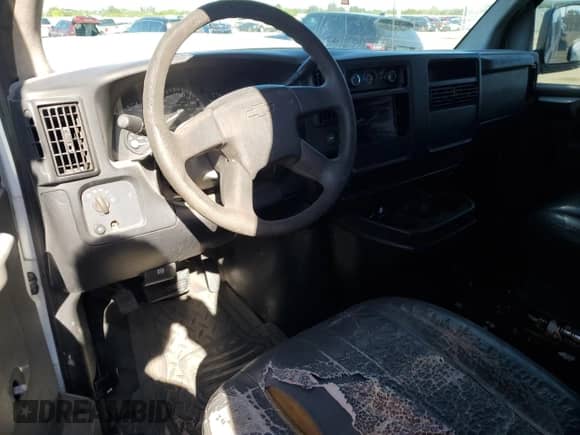 2003 Chevrolet Express Cargo с VIN 1GCFG15X031106612, выставлен на аукционе Copart как лот 48154145 с пробегом 256 352 миль миль и Списание • Salvage title. История ставок и продаж доступна на DreamBid. Изображение 8.