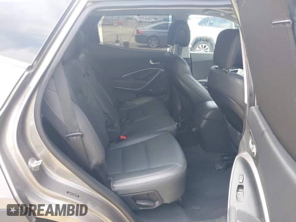 2018 Hyundai Santa Fe Ultimate with VIN 5NMZW4LAXJH069328, listed as a IAAI auction lot 42487378 with 51,859 mi miles and . Bid and sale history available at DreamBid. Image 8.