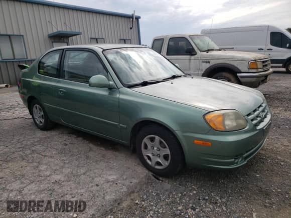 2005 Hyundai Accent GLS с VIN KMHCG35C05U325871, выставлен на аукционе Copart как лот 64258985 с пробегом 166 574 миль миль и Списание • Salvage title. История ставок и продаж доступна на DreamBid. Изображение 4.