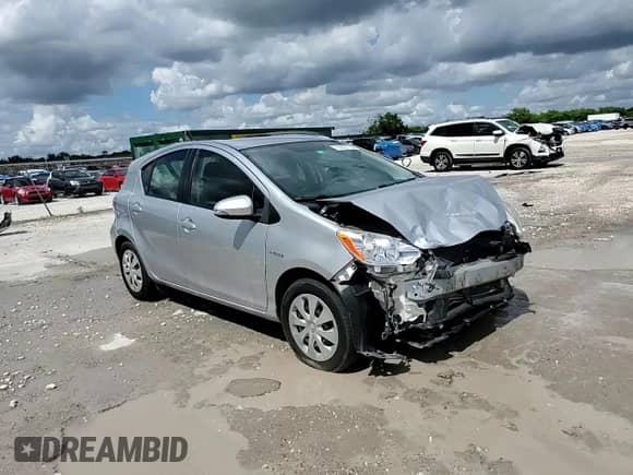 2014 Toyota Prius Two z VIN JTDKDTB3XE1569140, wystawiony jako Copart lot #85337755 z przebiegiem 129 826 mil mil oraz Szkoda całkowita • Salvage title. Historia ofert i sprzedaży dostępna na DreamBid. Obrazek 14.
